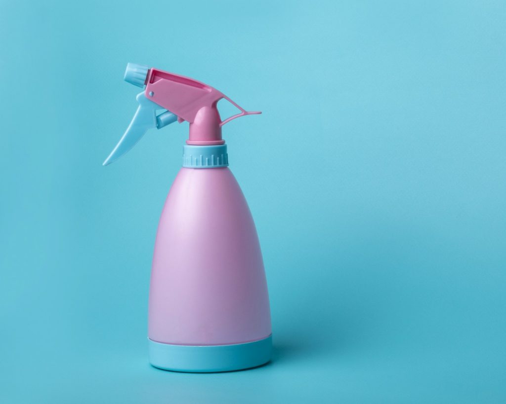 pink and white spray bottle