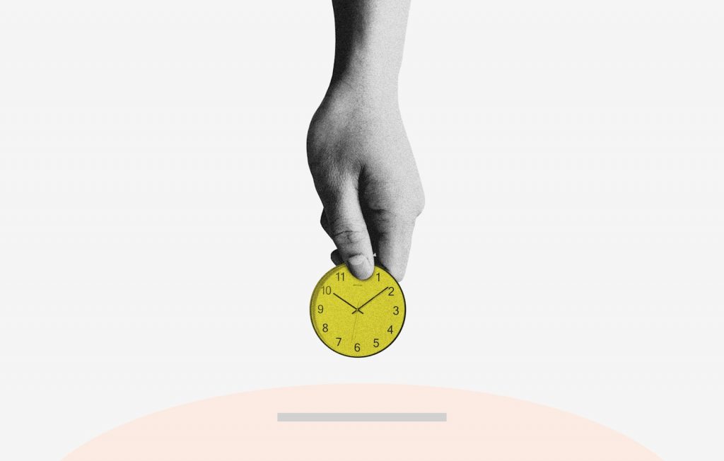Home 3 person holding yellow round analog clock